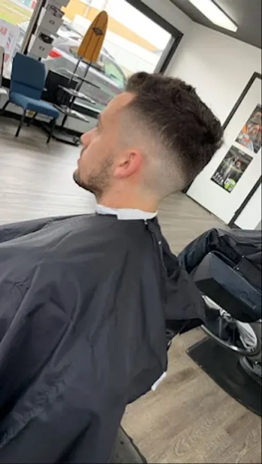 Skin fade haircut at Norcal Barbershop in Eureka, CA — clean lineup, textured top